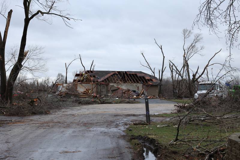 Damage to homes is seen near Julie Drive in Aroma Park on March 11, 2026 following a March 10 tornado that passed through Kankakee County.