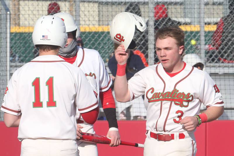 L-P's Kaedin Bond lifts his hat after scoring against Pontiac on Monday, March 24, 2025 at Huby Sarver Field inside the L-P Athletic Complex in La Salle.