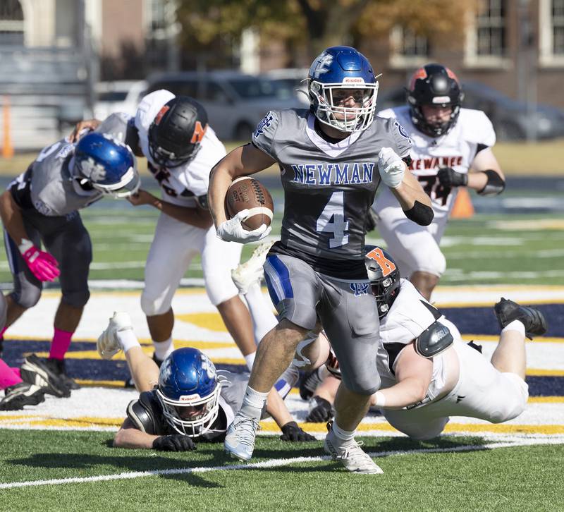 Newman’s Matthew Blackert looks for running room against Kewanee Saturday, Oct. 18, 2025.