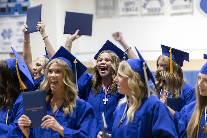Now Newman alumni, graduates celebrate Wednesday, May 21, 2025, at the end of commencement.