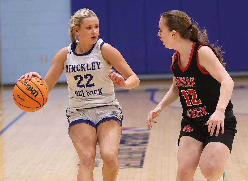 Hinckley-Big Rock's Anna Herrmann brings the ball up against Indian Creek's Bethany Odle during their game Thursday, Jan. 29, 2026, at Hinckley-Big Rock High School.