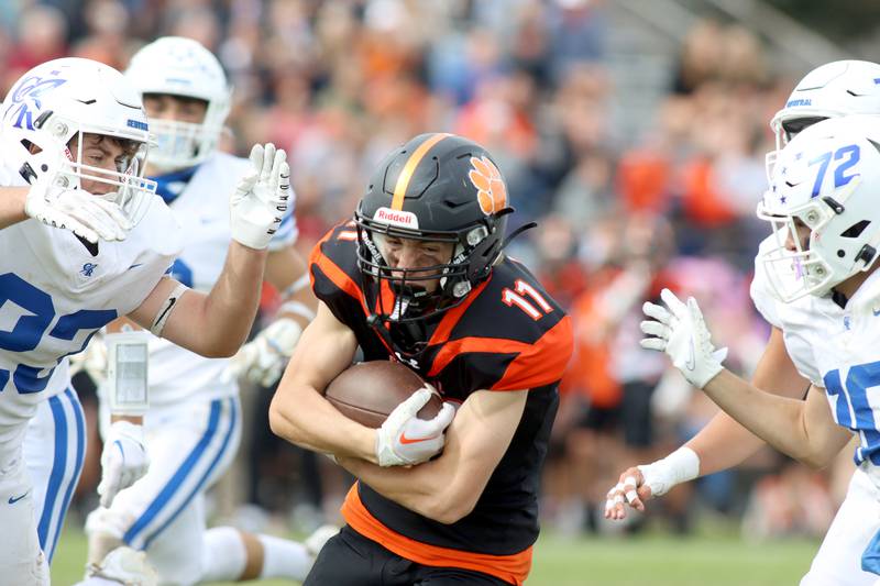 Crystal Lake Central’s Thomas Hammond runs the ball against Burlington Central in varsity football at Crystal Lake Saturday.