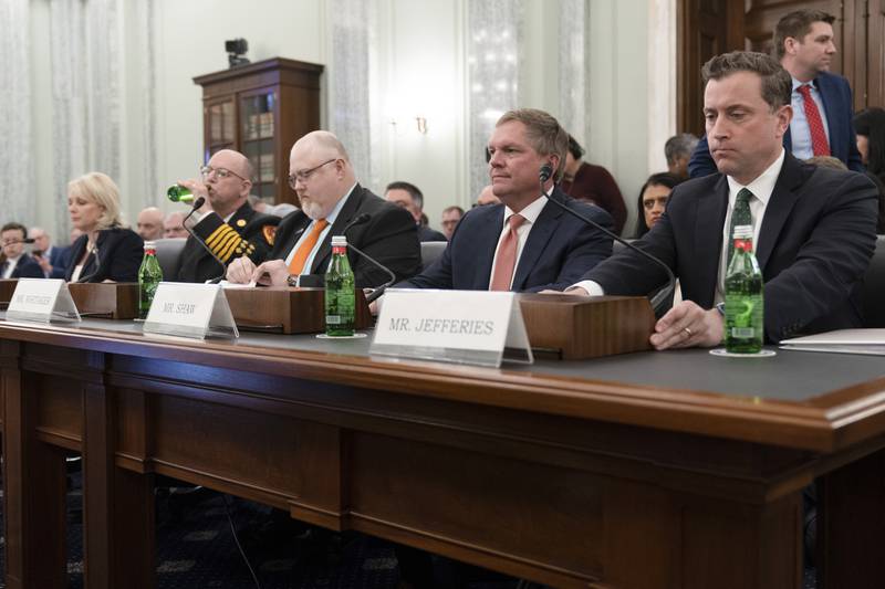 Witnesses from left, National Transportation Safety Board Chair Jennifer Homendy; Ohio Western Reserve Joint Fire District Chief David Comstock; Ohio State SMART-TD Legislative Director Clyde Whitaker; Norfolk Southern CEO Alan Shaw; and Association of American Railroads CEO Ian Jefferies, are seated during a Senate Commerce, Science, and Transportation Committee hearing on improving rail safety in response to the East Palestine, Ohio train derailment, on Capitol Hill in Washington, Wednesday, March 22, 2023. (AP Photo/Manuel Balce Ceneta)