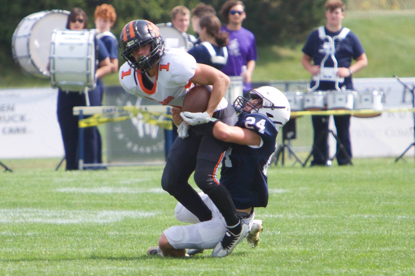 McHenry's Jacob Zarek is tackled by Cary-Grove's Josh Domagala on Saturday, Sept. 17,2022 in Cary.