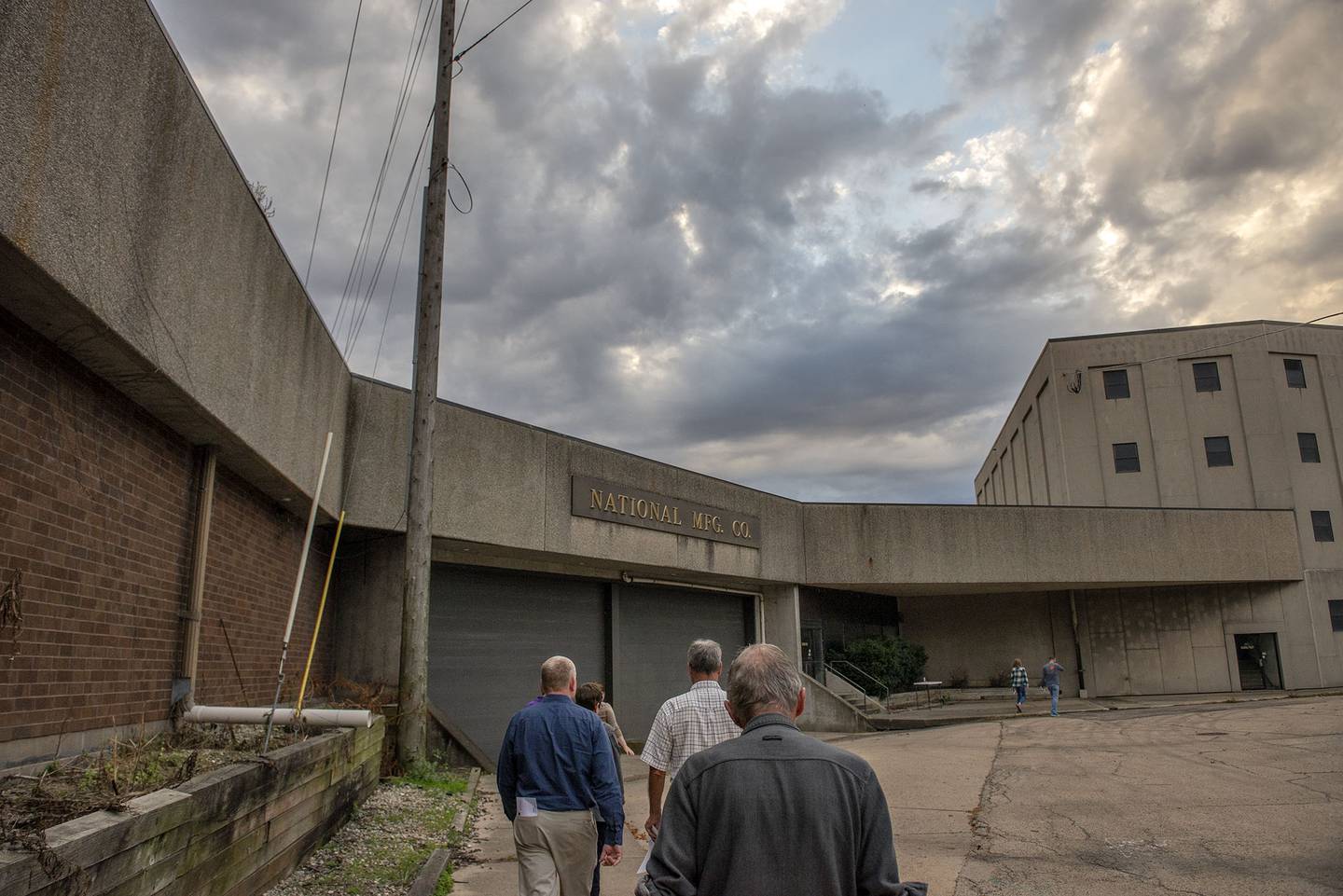The Sterling Riverfront Commission, which conducted tours such as this one in October, is seeking the public’s input on ideas to revitalize the National and Lawrence Bros. buildings.