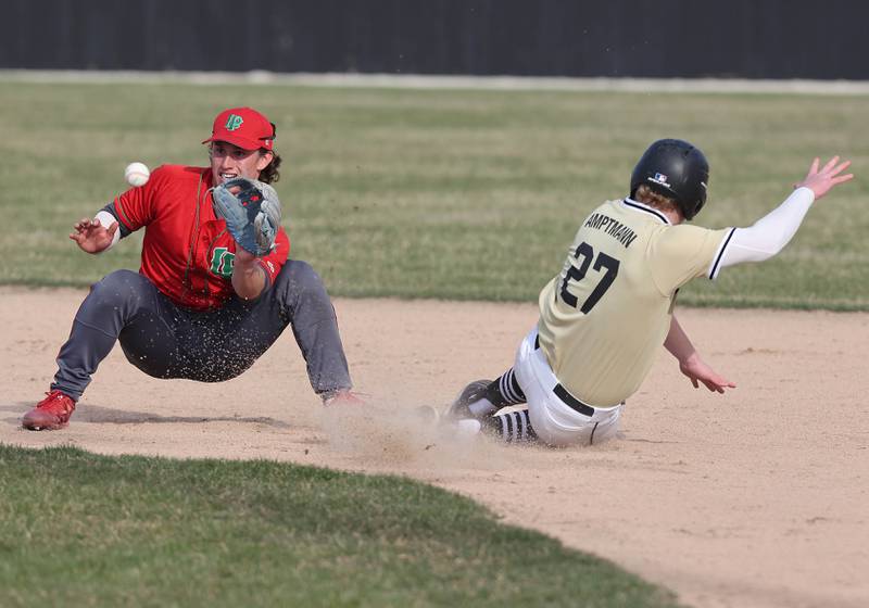 Sycamore's Jimmy Amptmann slides safely into second with a stolen base as LaSalle-Peru's Jack Scheri takes the throw during their game Monday, April 11, 2022, at the Sycamore Community Sports Complex.