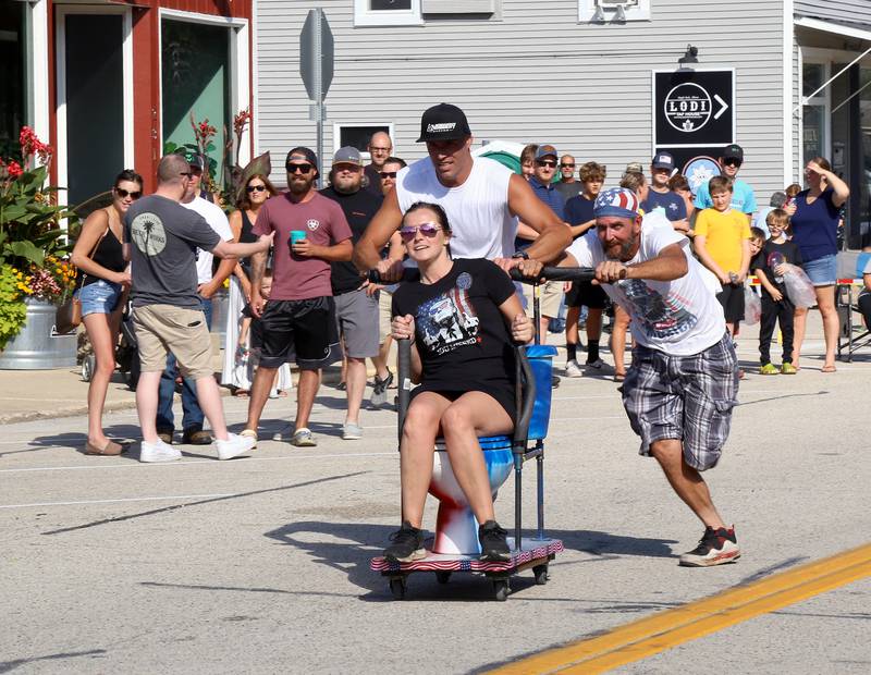 Team Main Street Patriots competes in the 2024 Maple Park Fun Fest Toilet Bowl Races on Saturday, Aug. 31, 2024 in Maple Park.