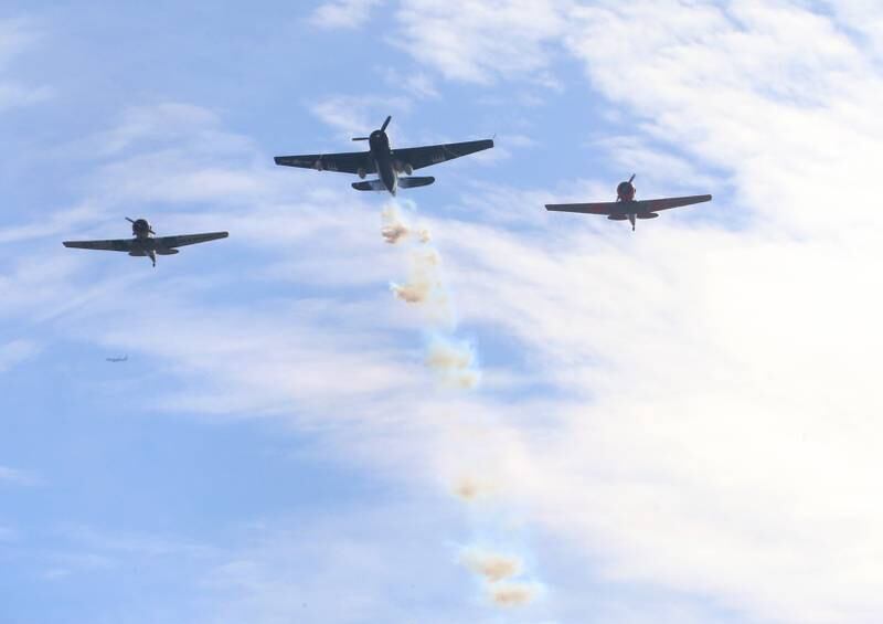 World War II TBM Torpedo Bomber and T-6 Marine trainers fly during the 16th annual Utica Veterans Parade and Air Show on Sunday Nov. 5, 2023 downtown Utica.