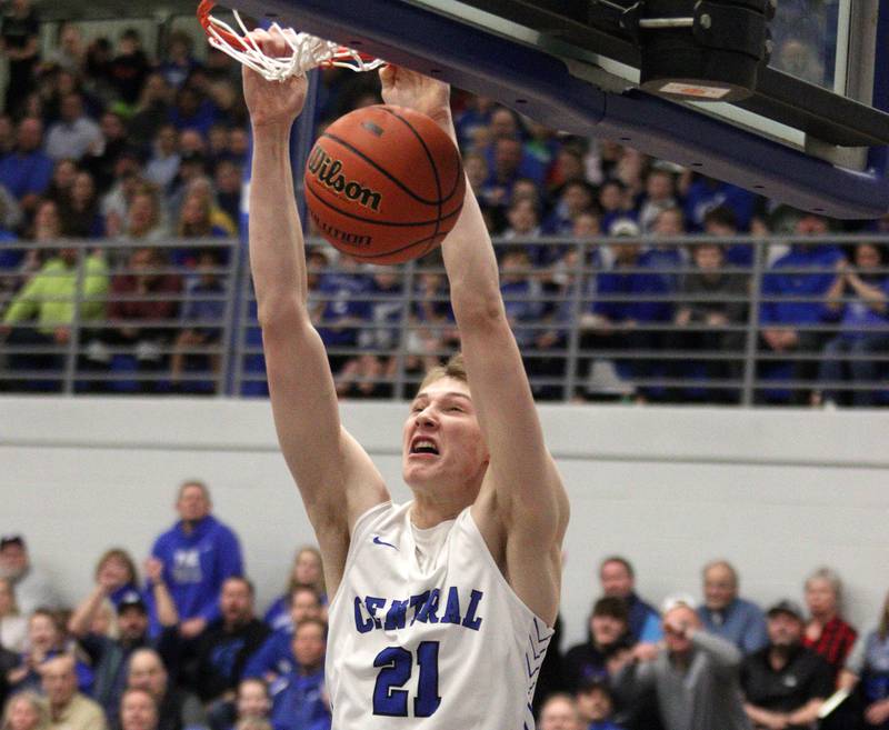 Burlington Central’s Drew Scharnowski slam dunks the ball early against Rockford Boylan in IHSA Class 3A sectional action at Burlington Central High School on Wednesday, March 1, 2023.