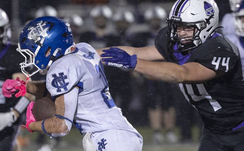 Newman’s Rylan Alvarado picks up yards against El Paso’s Harlin Toillion Saturday, Nov. 8, 2025.