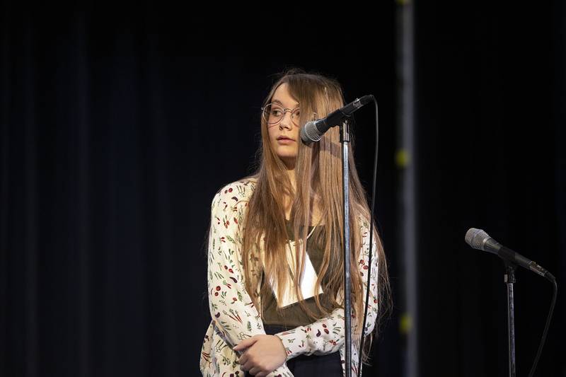 Ashton-Franklin Center Jr. High eighth grader Kate Viall appears on stage Thursday, March 9, 2023 during the Lee-Ogle-Whiteside Regional Spelling Bee.