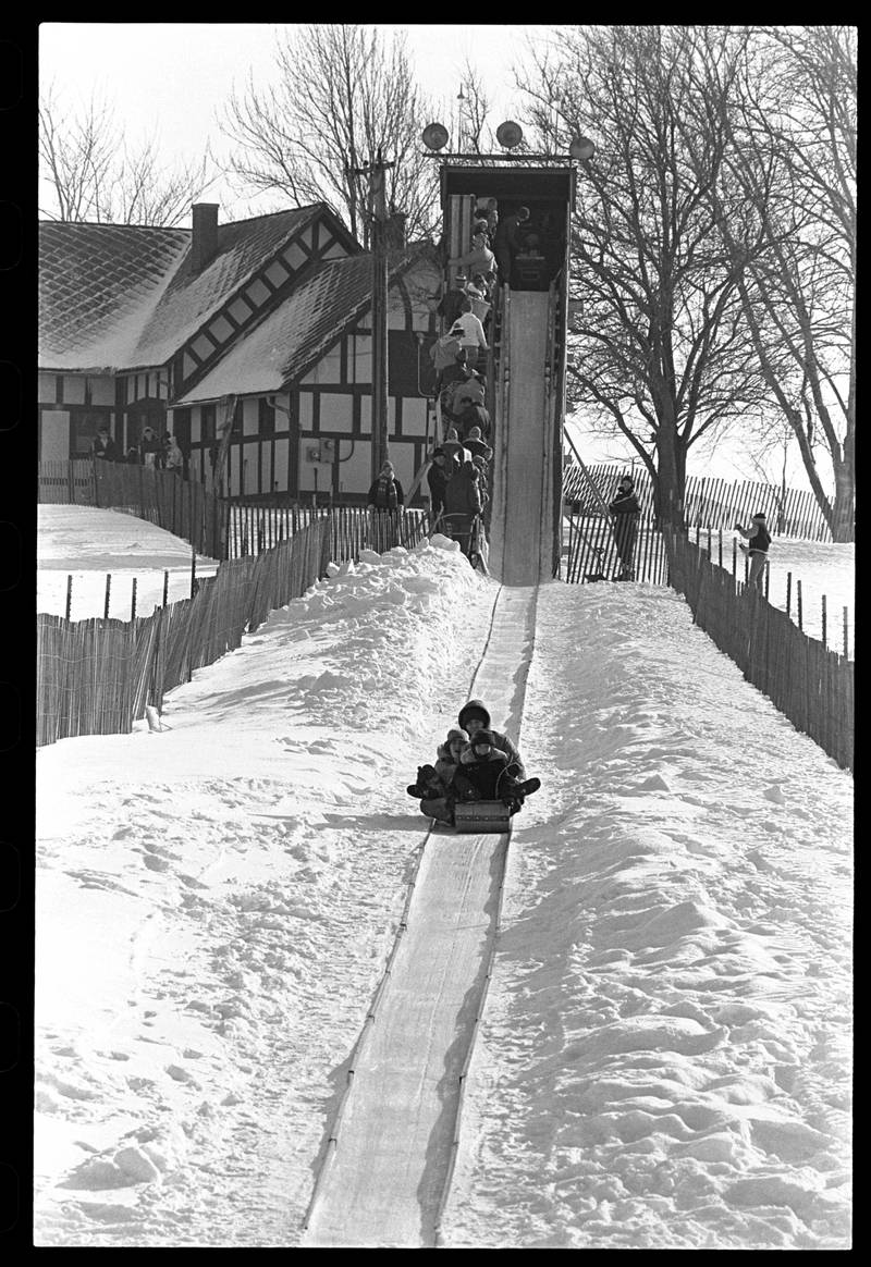 Tobogganers slide through Joliet's Woodruff Golf Course in 1967.