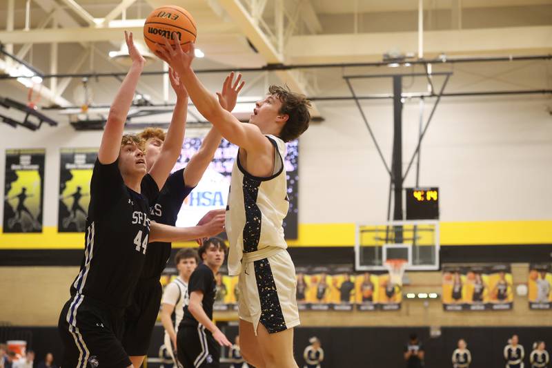 Lemont’s Lucas Glotzbach lays in a shot against St. Francis in the Class 3A Hinsdale South Regional semifinal game on Tuesday, March 3, 2026 in Darien.
