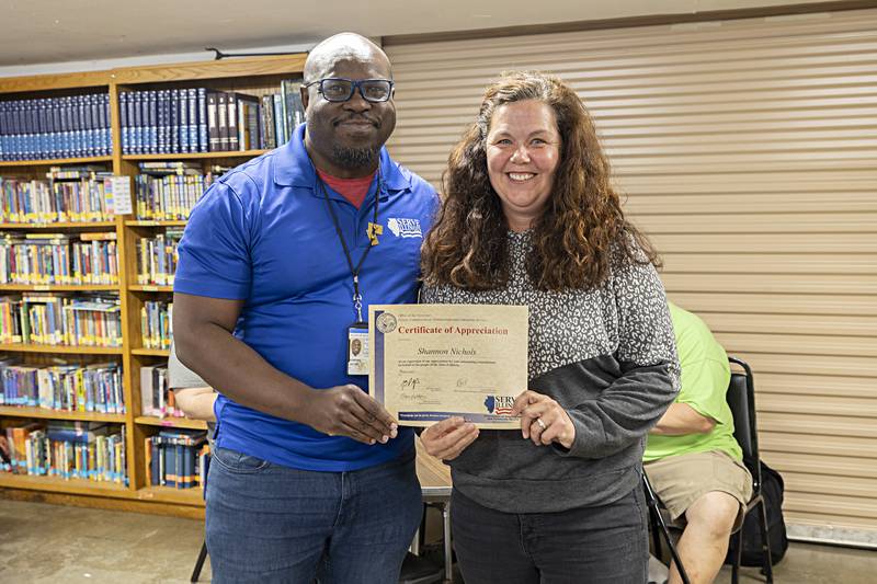Shannon Nichols, one of ten Teen Turf volunteers, was recognized Tuesday, Sept. 26, 2023 with a certificate from Volunteer Program Coordinator Jacob Jenkins.
