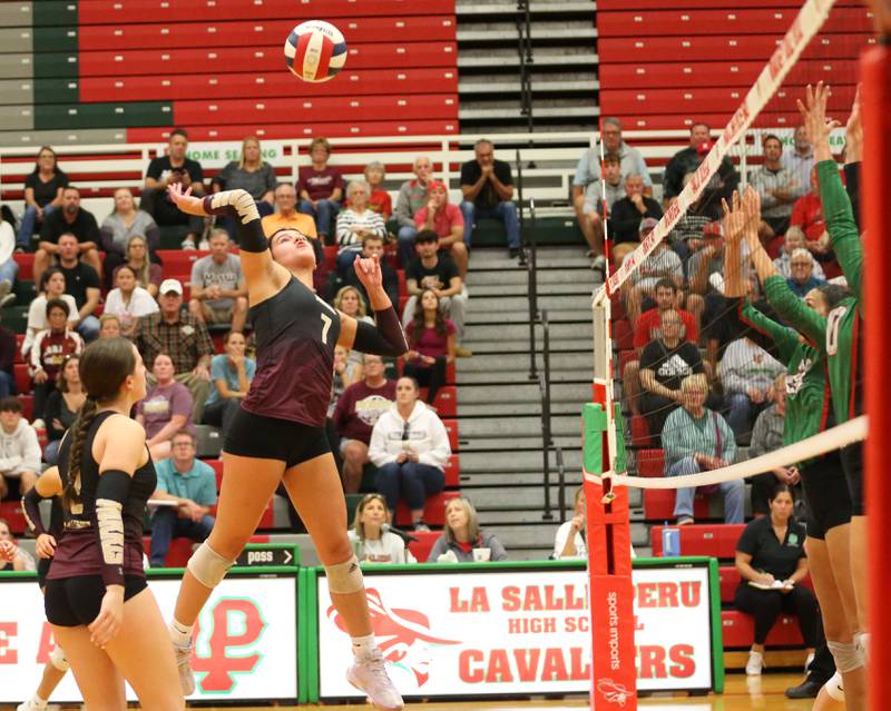 Morris's Rosemary Misener sends a spike past L-P on Thursday, Oct. 10, 2024 in A.J. Sellett Gymnasium at L-P High School.