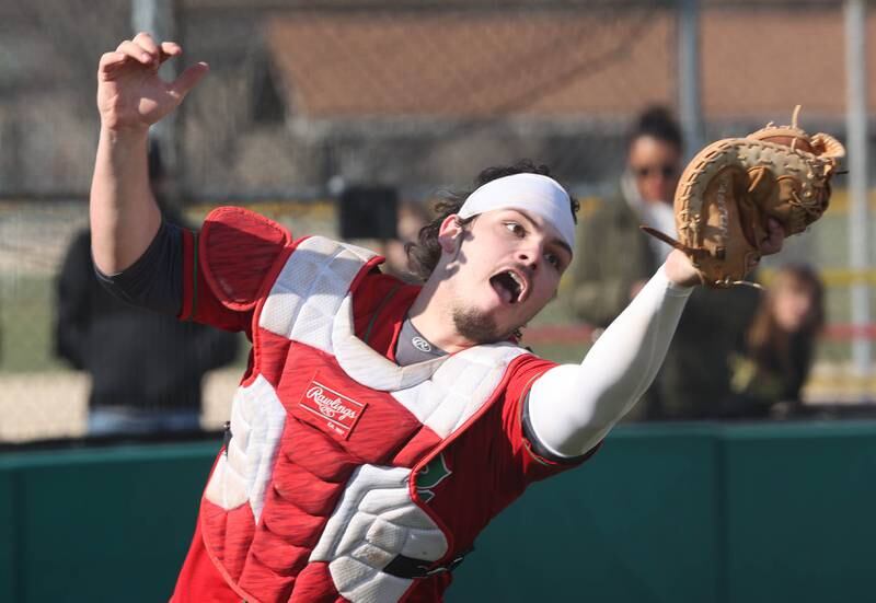 LaSalle-Peru's Aidan VanDuzer catches a foul ball during their game against Sycamore Monday, April 11, 2022, at the Sycamore Community Sports Complex.