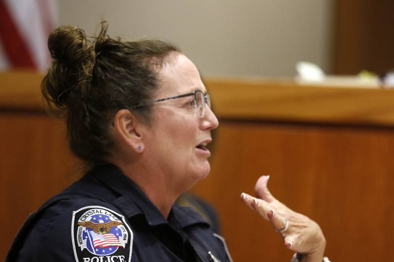 Crystal Lake Police officer Kimberley Shipbaugh testifies during at trial for the former Illinois Department of Children and Family Services employees Carlos Acosta and Andrew Polovin, before Lake County Judge George Strickland on Monday, Sept. 11, 2023, at the McHenry County courthouse. Acosta, 57, of Woodstock, and Polovin, 51, of Island Lake, each are charged with two counts of endangering the life of a child and health of a minor, Class 3 felonies, and one count of reckless conduct, a Class 4 felony, related to their handling of the AJ Freund case.