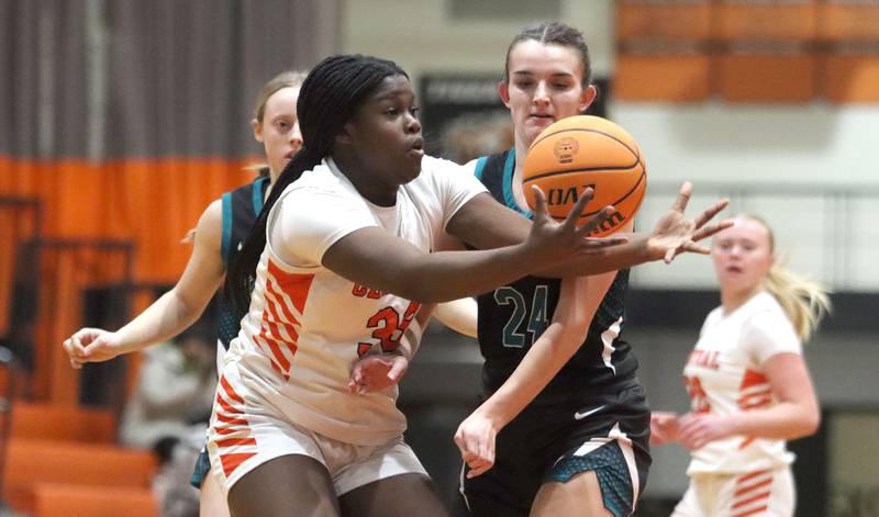 Crystal Lake Central’s Pekun Bolarin corrals the ball against Woodstock North in varsity girls basketball on Monday, Jan. 26, 2026, at Crystal Lake Central High School in Crystal Lake.