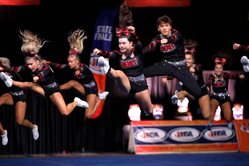 Members of the Benet Academy cheerleading team compete in the medium team division of the IHSA State Finals on Saturday, Feb. 8, 2025 at Grossinger Motors Arena in Bloomington.