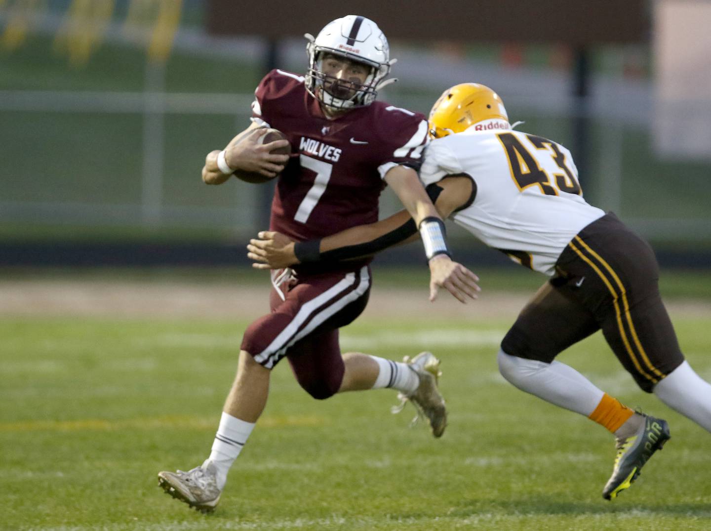 Prairie Ridge's Tyler Vasey breaks a tackle attempt from Jacobs' Luke Gormsen as Vasey returns the kickoff for a touchdown during a Fox Valley Conference football game between Jacobs and Prairie Ridge Friday, Sept. 16, 2022, at Jacobs High School in Algonquin.