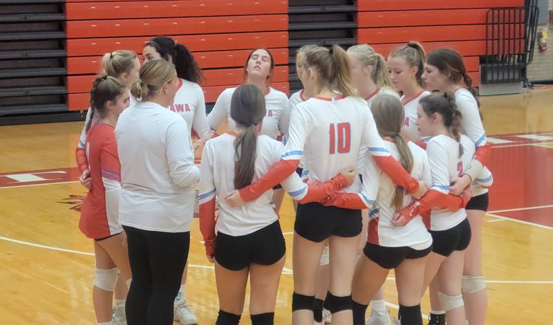 The Ottawa volleyball team talks prior to the third set of Thursday's Interstate 8 Conference match against Sycamore at Kingman Gym.