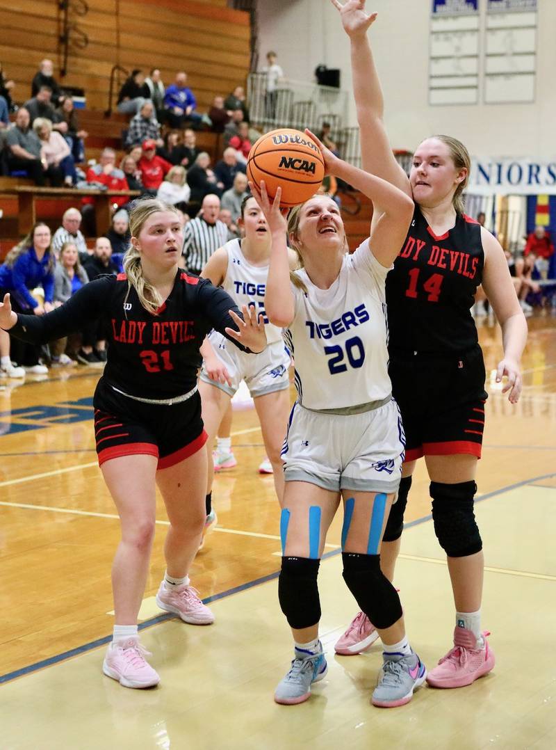 Princeton's Reese Reviglio shoots in front of Hall's Ella Sterling in Thursday's game at Prouty Gym. The Tigresses won 34-30.