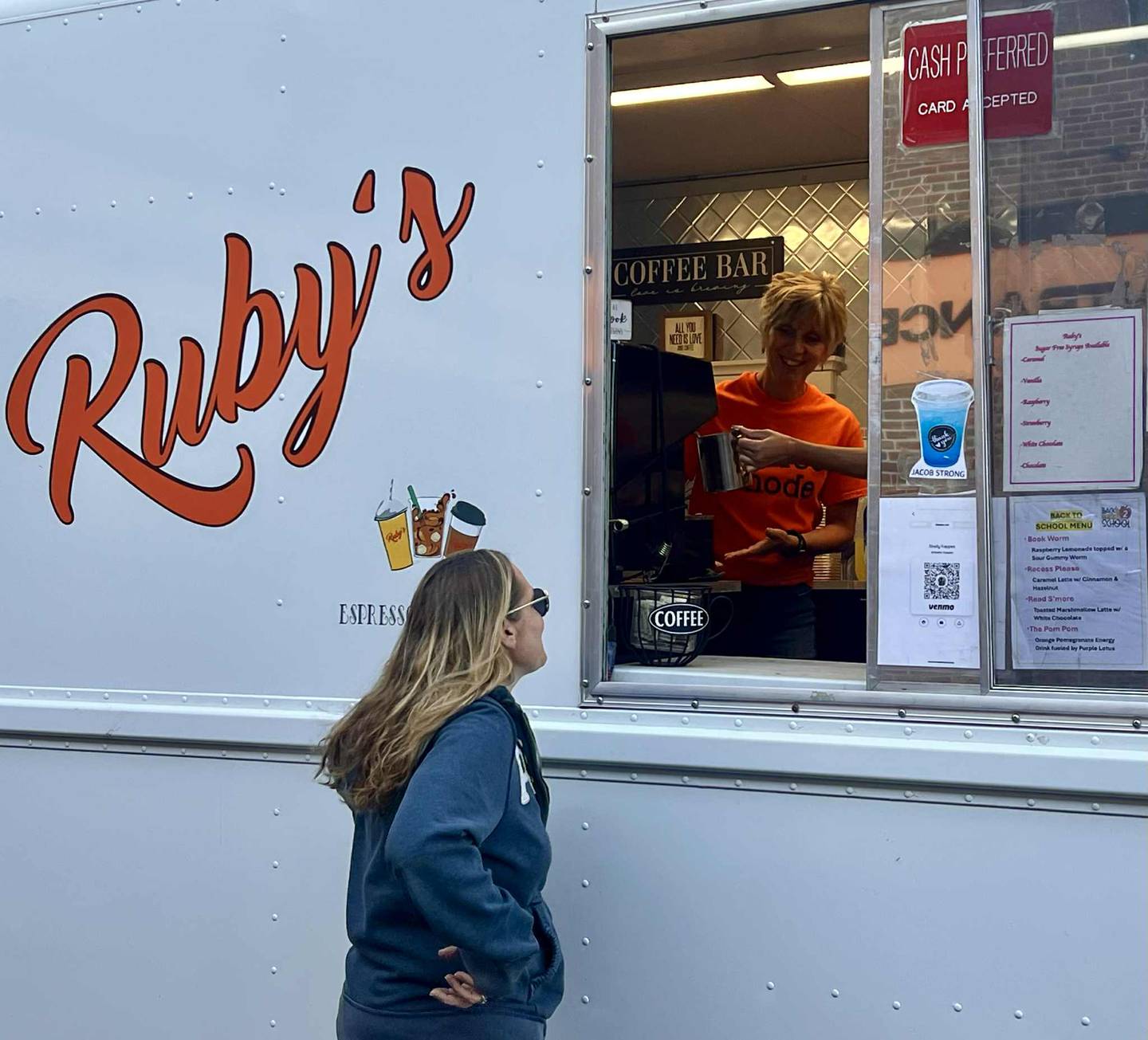 Shelly Kappes, owner of Ruby's Coffee Coach, smiles as she takes a customers order.
