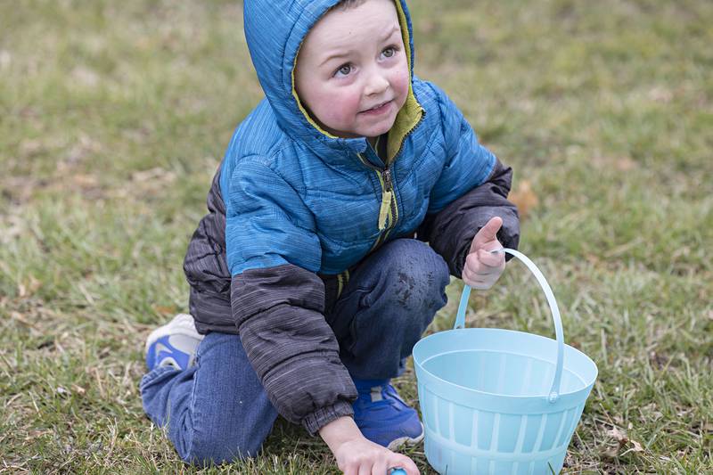 Logan Hoagland, 3, of Rock Falls snatches up eggs along with big sister Courtney (who is not pictured) on Saturday, April 1, 2023 at Centennial Park in Rock Falls.