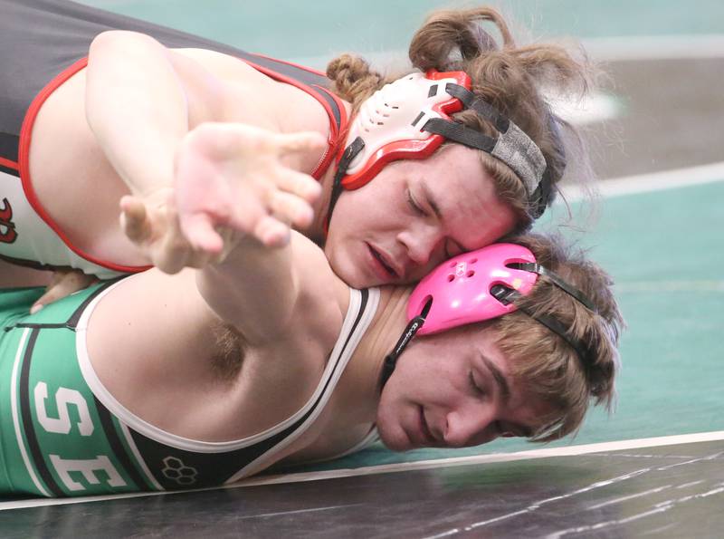 Ottawa's Charles Medrow wrestles Seneca's Chris Peura in the 220 weight class during a meet on Monday, Jan. 30, 2023 at Seneca High School.