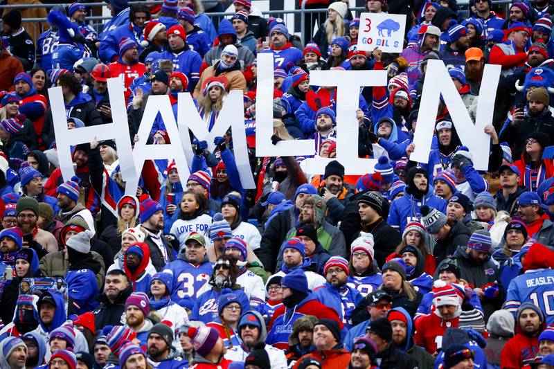 Fans hold a sign in support of Buffalo Bills safety Damar Hamlin during the second half against the New England Patriots, Sunday, Jan. 8, 2023, in Orchard Park.