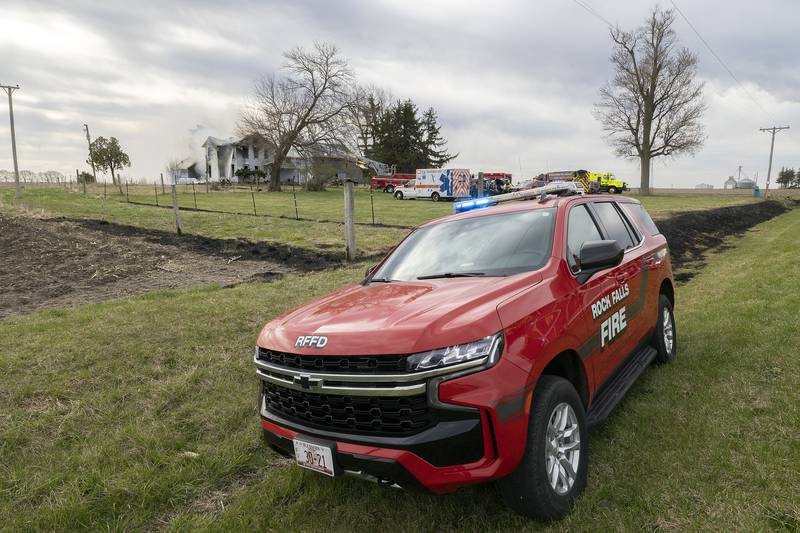 Firefighters respond to a fire Monday, April 14, 2025, before 8 a.m. at 1308 Harmon Road, in rural Lee County.