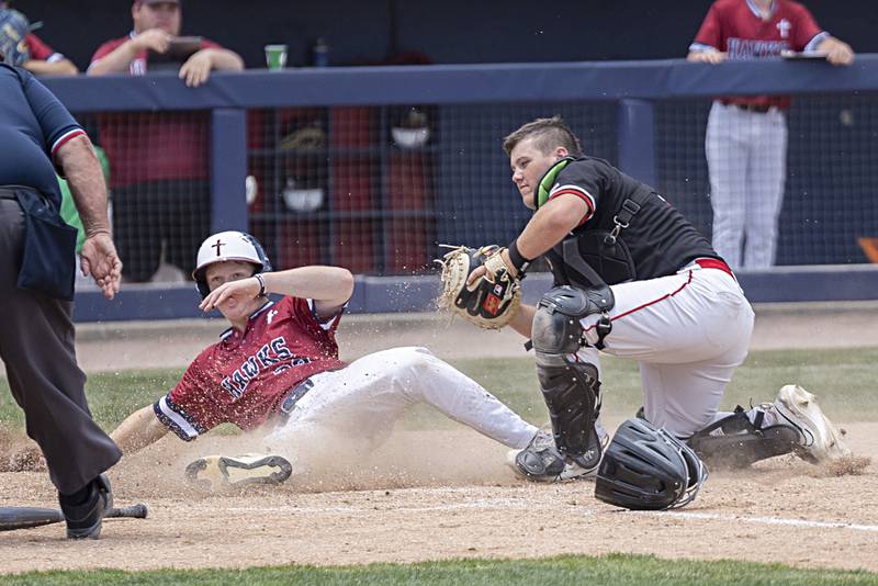 Henry-Senachwine’s Colton Williams tags out Gibrault’s Jack Keevan Saturday, June 3, 2023 during the IHSA class 1A championship baseball game.