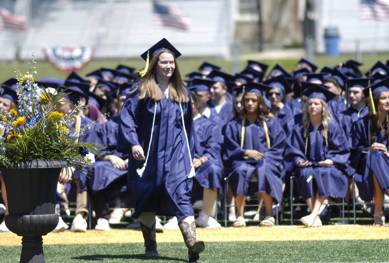 A Sterling grad wears her cowboy boots.  The Sterling Class of 2025 Commencement Ceremony was held on Sunday, May 18, 2025 at Roscoe Eades Field in Sterling.