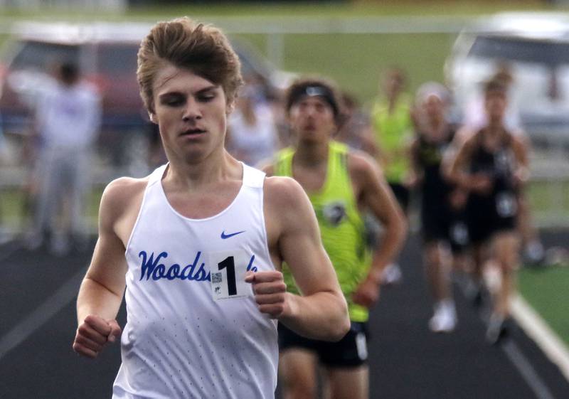 Woodstock’s Ellery Shutt cruises to victory in the 3200 meter run during the Kishwaukee River Conference Boys Track and Field Meet on Tuesday, May 12, 2026, at Johnsburg High School.