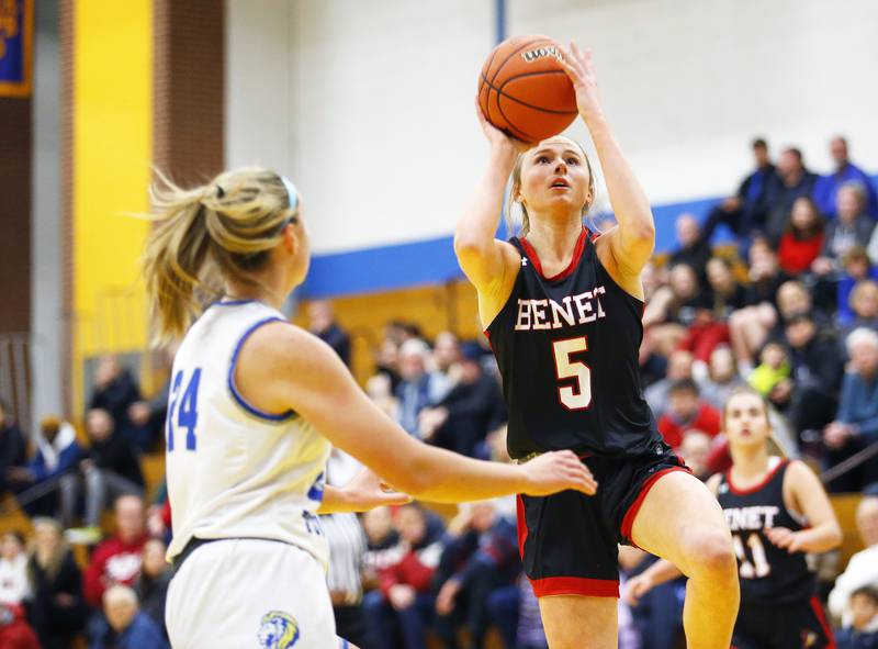 Benet's Lenee Beaumont (5) puts up the ball during the girls varsity basketball game between Benet Academy and Lyons Township on Wednesday, Nov. 30, 2022 in LaGrange, IL.