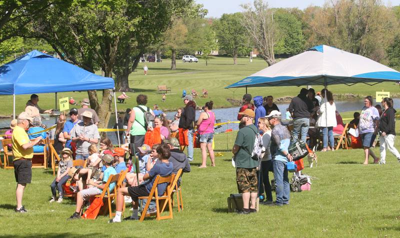 A large crowd gathers during the 25th annual Kids Fishing Expo on Saturday, May 10, 2025 at Baker Lake in Peru.