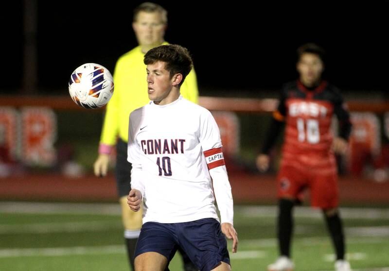 Conant’s Peter Cirbo gets control of the ball during a 3A St. Charles East Sectional semifinal against Glenbard East on Wednesday, Oct. 26, 2022.