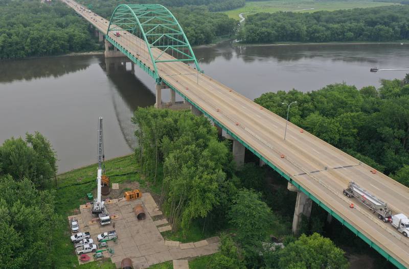 An aerial view of crews working on the Abraham Lincoln Memorial Bridge crossing the Illinois River near La Salle.  Work will maintain the bridge expansion joints. The project will begin in the southbound lanes and one lane of traffic will be open. Work will later shift to the northbound lanes. The $1.3 million project is expected to be completed by the end of July.
