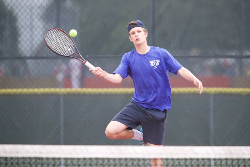 Wheaton North's David Hill competes in a doubles match at the DuKane Conference Meet on Saturday, May13,2023 in Batavia.