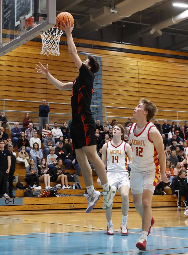 Wheaton Warrenville South's David Showman (23) lays up a basket during the IHSA boys class 4A Willowbrook regional final between Wheaton Warrenville South and Batavia on Friday, Feb. 27, 2026 in Villa Park, IL.