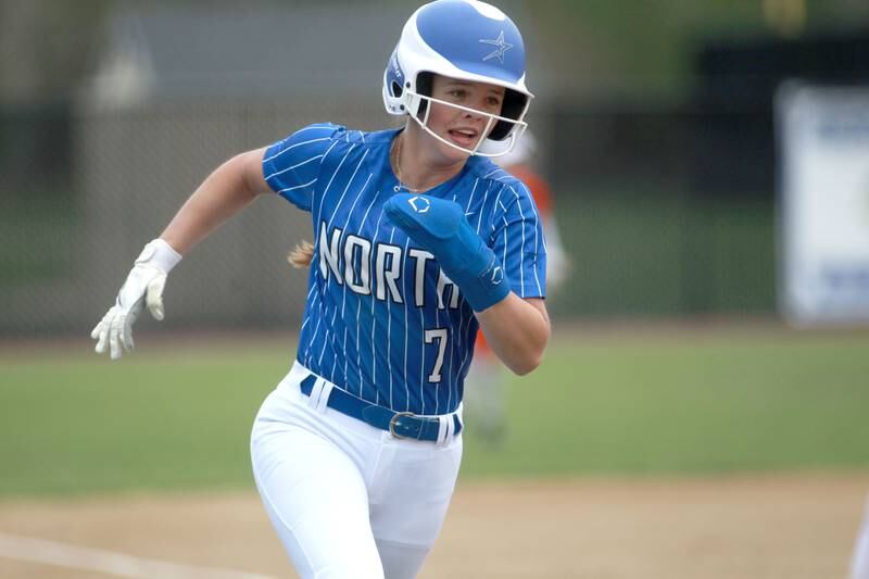 St. Charles North's Mackenzie Patterson runs home for a score during a game against St. Charles East on Friday, April 25, 2025 at St. Charles North.