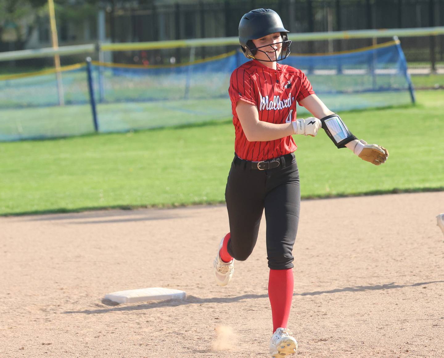 Henry-Senachwine's Alaina Sprague rounds second base after hitting a home run against Marquette on Thursday, April 23, 2026 at June Cross Field in Ottawa.