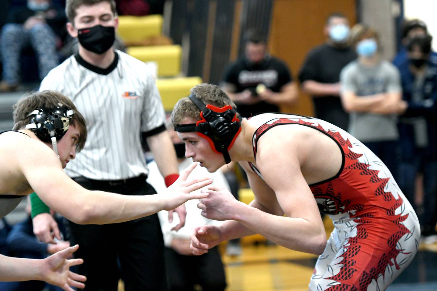 Erie's Andrew Bromleny wrestles Lisle's Joe Raineri in the title match at 195 pounds at the Polo Wrestling Invitational.