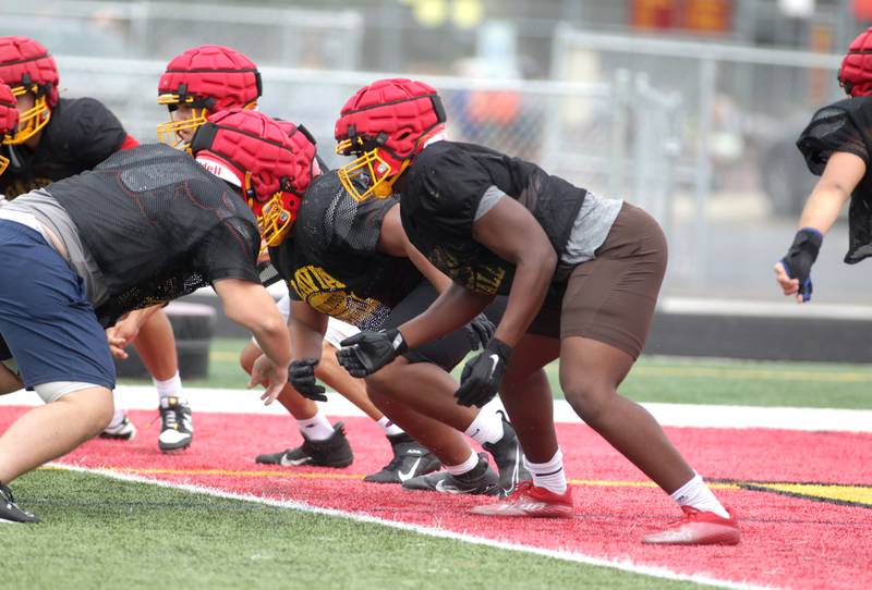 Batavia’s Jordan Buckley (far right) works with the defense during practice at the school on Thursday, Aug. 10, 2023.