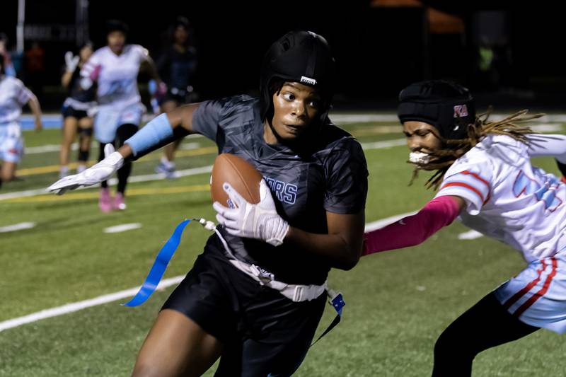 Willowbrooks's Jada Langston finds an opening during a varsity flag football IHSA State Quarterfinals game against Kenwood, held at Willowbrook High School on Oct. 17, 2025.