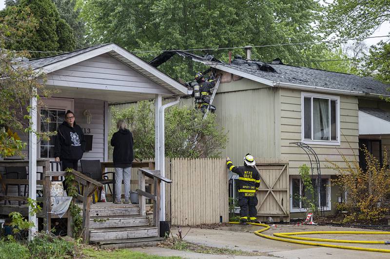 Firefighters work at the scene of a fire located in the 800 block of Avenue I on Monday, April 27, 2026, in Sterling.
