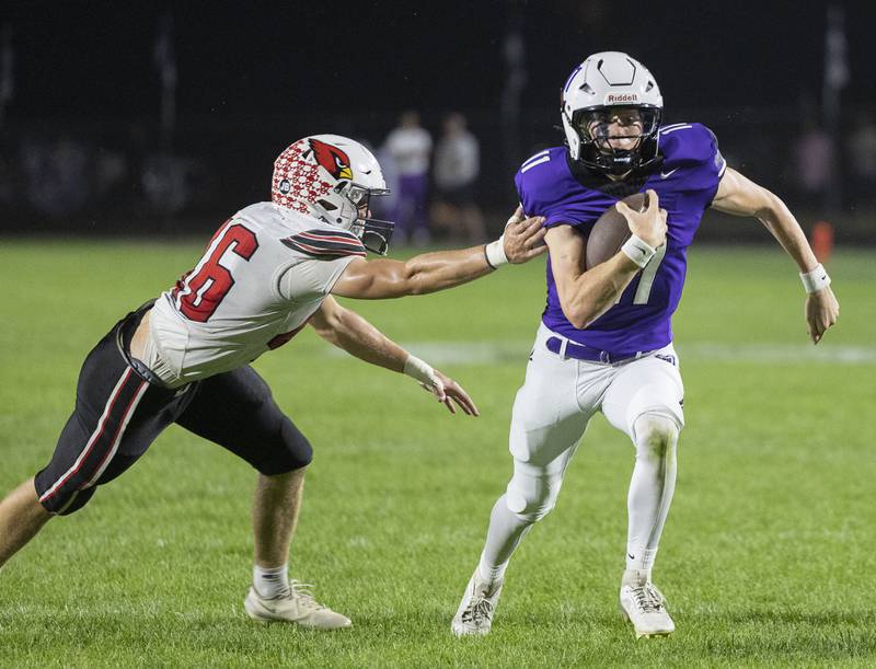 Dixon’s Jagger Kemp gets by Stillman Valley’s Ethan Waugh for a TD Friday, Oct. 3, 2025.