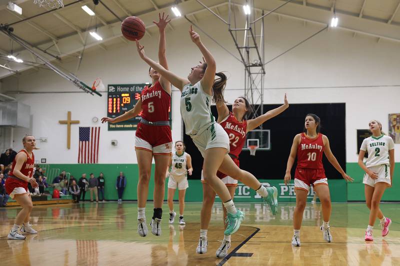 Providence’s Sydney Spencer flips up a shot against Mother McAuley on Monday, Jan. 8th, 2024 in New Lenox.