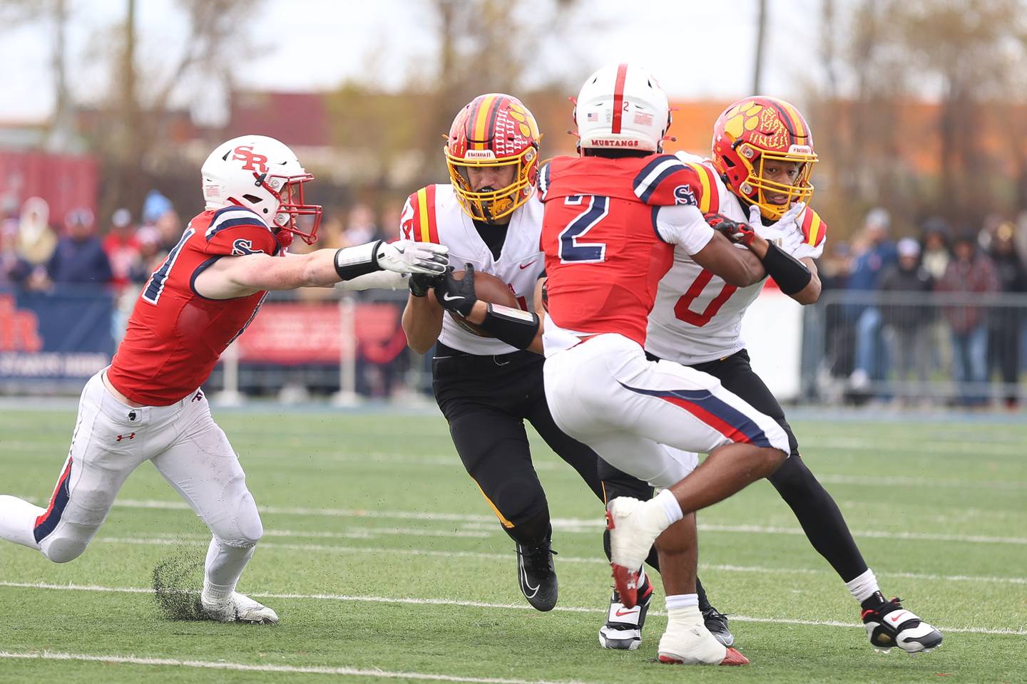 Batavia's Brennon Zeng runs after the catch against St. Rita in the Class 7A state semifinal on Saturday, Nov. 22, 2025 in Chicago.