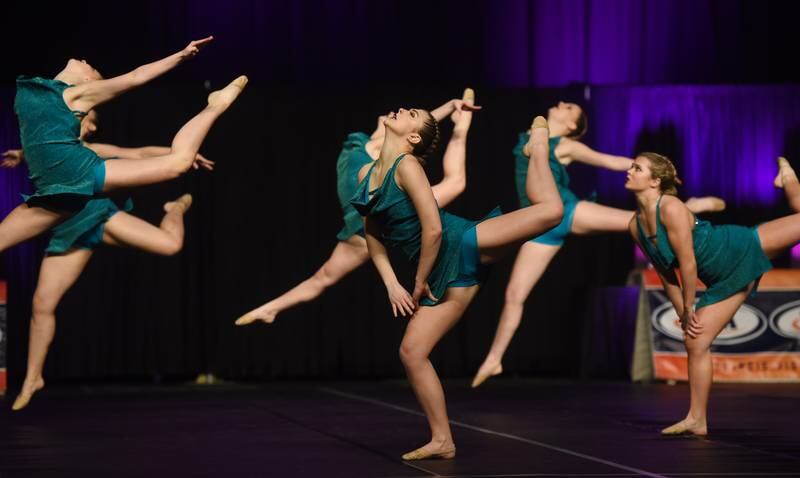 Joe Lewnard/jlewnard@dailyherald.com
Geneva performs during the Class 2A Competitive Dance finals at Grossinger Motors Arena in Bloomington Saturday.